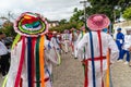 Cultural demonstration called Encontro de Chegancas in Saubara, Bahia. Members of a Marujada wear white clothes with colors and