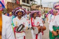 Cultural demonstration called Encontro de Chegancas in Saubara, Bahia. Members of a Marujada wear white clothes with colors and