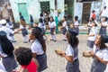 Women members of the cultural event Encontro de Chegancas, in Saubara Bahia, parade through the streets of the city dancing and