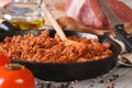 Sauce Bolognese in a pan and ingredients closeup horizontal Royalty Free Stock Photo
