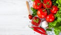 Sauce or ketchup and ingredients for his cooking: tomatoes, garlic, basil, parsley, red hot pepper and spices. Royalty Free Stock Photo