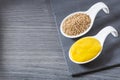 Sauce and seeds of yellow mustard - Sinapis alba Royalty Free Stock Photo