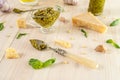 Sauceboat full of italian sauce basil pesto, vintage spoon. Royalty Free Stock Photo