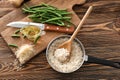 Saucepan with boiled rice on wooden table Royalty Free Stock Photo