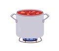 Saucepan on gas stove. Open sauce pan with boiling soup. Metal steel pot on cooker. Cooking process in deep kitchenware