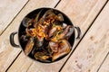 Saucepan of prepared mussels and vegetables. Royalty Free Stock Photo