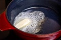 In a saucepan on the stove melt butter for the preparation of bechamel sauce and other dishes