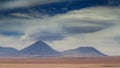 Saucer clouds over the volcano Licancabur Royalty Free Stock Photo