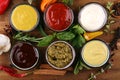 Sauces Assortment. Set of various sauces in bowls with ketchup, mayonnaise, pesto and mustard. Variety of induvidual marinades