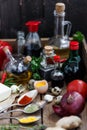 Sauces, oils and spices in a old wooden box Royalty Free Stock Photo