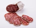 Saucisson sec delicious french salami on a white background Royalty Free Stock Photo