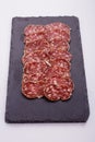 Saucisson sec delicious french salami on a white background Royalty Free Stock Photo