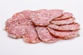 Saucisson sec delicious french salami on a white background Royalty Free Stock Photo