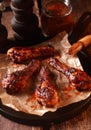 Saucy Barbecued Chicken Drumsticks on Iron Pan