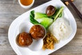 Saucy meatball dish in white plate ready to eat Royalty Free Stock Photo
