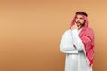 The Saudi Arab man is thinking about something. Dishdasha, kandora, thobe, islam. Copy space