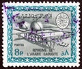 SAUDI ARABIA - CIRCA 1966: A stamp printed in Saudi Arabia shows Gas Oil Plant Cartouche of King Saud, circa 1966.