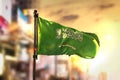 Saudi Arabia Flag Against City Blurred Background At Sunrise Backlight Royalty Free Stock Photo