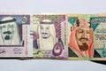 Saudi Arabia riyals banknotes isolated on a white background, 5 Saudi riyals with photo of king Salman and king Abdullah