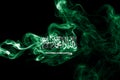 Saudi Arabia national smoke flag isolated on a black background. Royalty Free Stock Photo