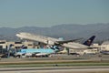 Saudi Arabian Airlines Boeing B-777-368(ER)HZ-AK21 departing Los Angeles .