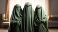 Saudi Islamic women in green burqas Royalty Free Stock Photo