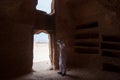 Saudian inside a Nabatean tomb in MadaÃÂ®n Saleh archeological si Royalty Free Stock Photo