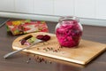 Sauerkraut with beets and spices in a glass jar Royalty Free Stock Photo