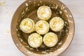 Sauerkraut fermentation in copper bowl, glass pot. Cut white cabbage fermented by lactic acid bacteria Royalty Free Stock Photo