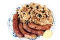 Sauerkraut and grilled sausages Royalty Free Stock Photo