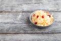 Sauerkraut, marinated cabbage on a gray wooden background. Side view, copy space