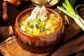 Sauerkraut soup in ceramic bowl on wooden table Royalty Free Stock Photo