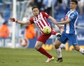 Saul Niguez of Atletico Madrid and Gerard Moreno of RCD Espanyol