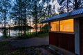 Sauna building near the lake in the summer evening