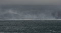 View of the smokey beach of Saunders Island, South Sandwich Islands - a remote island chain in the Atlantic Ocean