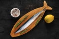 Saury on a wooden Board Royalty Free Stock Photo