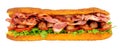 Sausage and bacon filled ciabatta bread sandwich Royalty Free Stock Photo