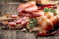 Sausage with bread and spices on a old wooden table Royalty Free Stock Photo