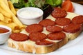 Sausage with cheese on slice of bread Royalty Free Stock Photo