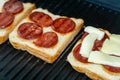 Sausage and cheese toast. toaster bread in toaster Royalty Free Stock Photo