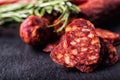 Sausage Chorizo. Spanish traditional chorizo sausage, with fresh herbs, garlic, pepper and chili peppers. Traditional cuisine Royalty Free Stock Photo