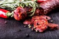 Sausage Chorizo. Spanish traditional chorizo sausage, with fresh herbs, garlic, pepper and chili peppers. Traditional cuisine Royalty Free Stock Photo