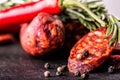 Sausage Chorizo. Spanish traditional chorizo sausage, with fresh herbs, garlic, pepper and chili peppers. Traditional cuisine Royalty Free Stock Photo