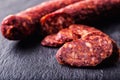 Sausage Chorizo. Spanish traditional chorizo sausage, with fresh herbs, garlic, pepper and chili peppers. Traditional cuisine Royalty Free Stock Photo