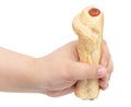 Sausage in dough in hand isolated on white background