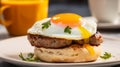 A sausage and egg English muffin, cooked sausage patty, egg and cheese sandwiched in toasted muffin