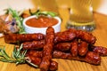 Sausage and fried pork ribs with beer.