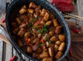 Sausage goulash, spicy hungarian style in a rustic pot Royalty Free Stock Photo