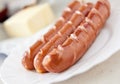 Sausage hot dog food at plate Royalty Free Stock Photo