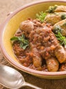 Sausage & Lentil Stew with Pesto Roasted Potatoes Royalty Free Stock Photo